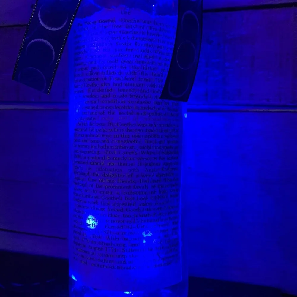 Handcrafted, upcycled decoupage bottle lantern Vintage encyclopedia Goethe page